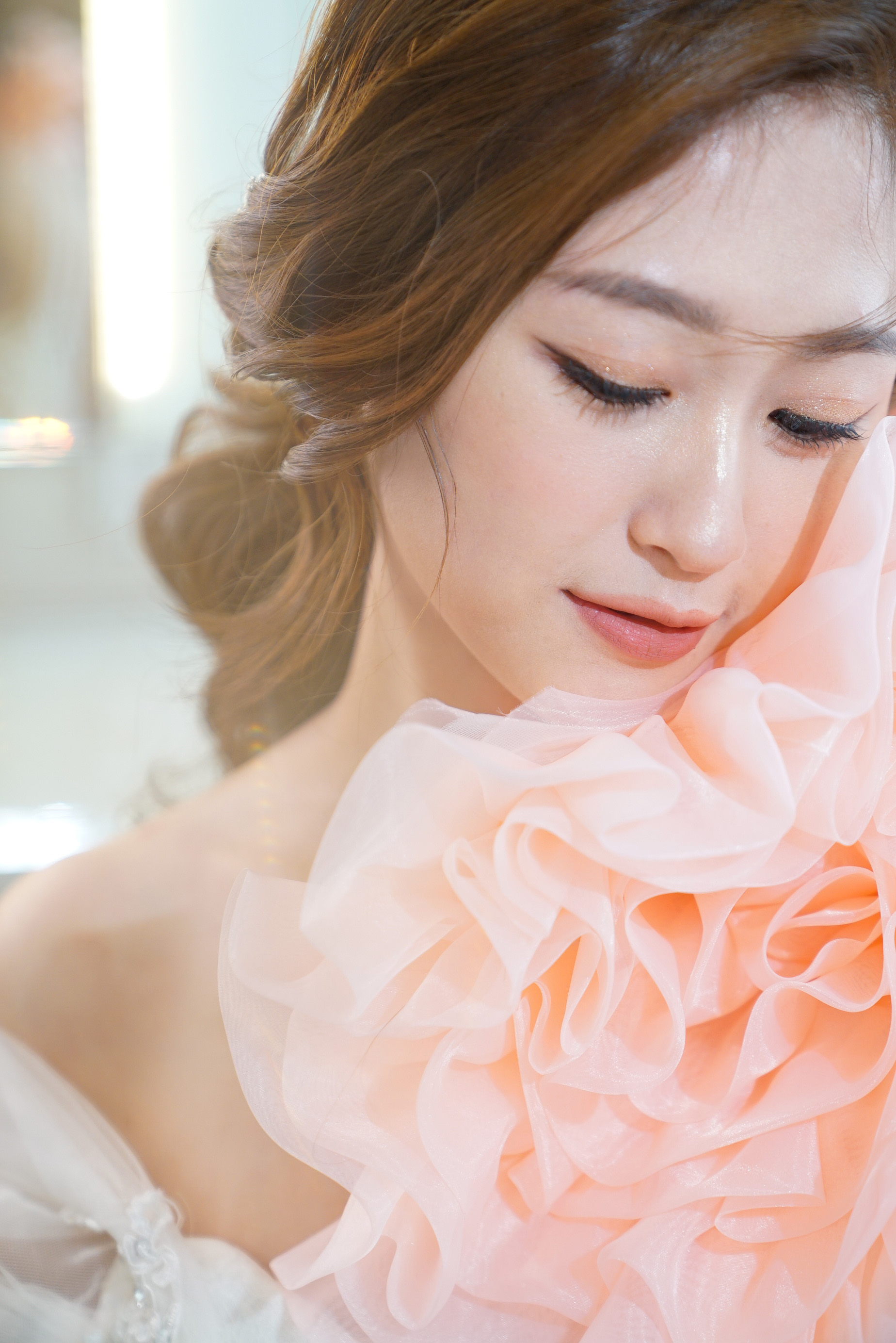 Studio prewedding portrait with sleek blowout