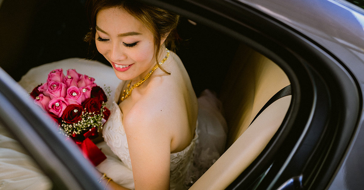 Bride in romantic updo with soft floral accessories